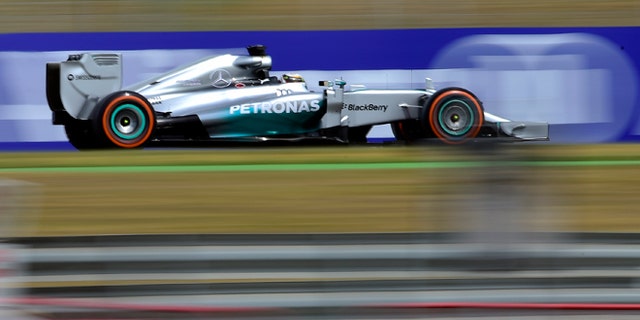 Mercedes driver Lewis Hamilton of Britain steers his car during the third free practice ahead of the Spain Formula One Grand Prix at the Barcelona Catalunya racetrack in Montmelo, near Barcelona, Spain, Saturday, May 10, 2014. (AP Photo/Manu Fernandez)