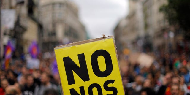 Sept. 25, 2012: Protestors hold a banner reading "you don't represent us"  during a demonstration  against austerity measures announced by the Spanish government in Madrid, Spain.
