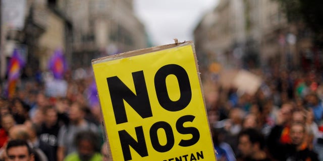 Sept. 25, 2012: Protestors hold a banner reading "you don't represent us" during a demonstration against austerity measures announced by the Spanish government in Madrid, Spain.