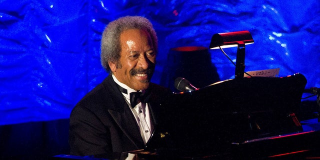 FILE - In this June 16, 2011 file photo, Allen Toussaint performs onstage at the 42nd Annual Songwriters Hall of Fame Awards in New York. Legendary New Orleans musician and composer Allen Toussaint has died after suffering a heart attack following a concert he performed in the Spanish capital. Madrid emergency services spokesman Javier Ayuso says rescue workers were called to Toussaint's hotel early Monday Nov. 9, 2015 and managed to revive him after he suffered a heart attack but he stopped breathing during the ambulance ride to a hospital and efforts to revive him again were unsuccessful. Toussaint performed Sunday night at Madrid's Lara Theater. (AP Photo/Charles Sykes, File)