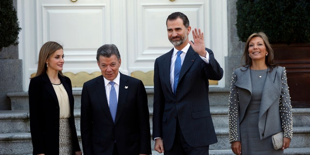 File photo - Spanish Queen Letizia (L-R), Colombian President Juan Manuel Santos, Spanish King Felipe and Colombian First Lady Maria Clemencia Rodriguez pose before a luncheon at Zarzuela Palace outside Madrid March 1, 2015.