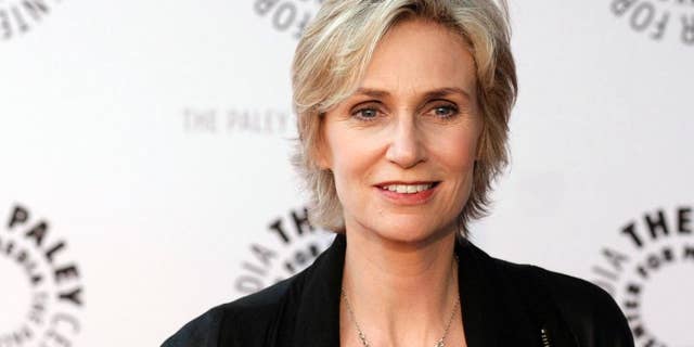 FILE - In this March 13, 2010, file photo, actress Jane Lynch arrives at the "Glee" PaleyFest panel discussion in Beverly Hills, Calif. Lynch will attend the opening ceremony of the Special Olympics USA Games on Sunday. (AP Photo/Dan Steinberg, File)