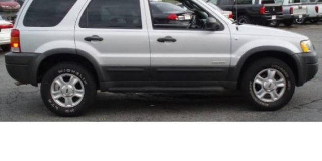 This image shows Spindler's 2002 silver Ford Escape -- with South Carolina license plate No. KFI776