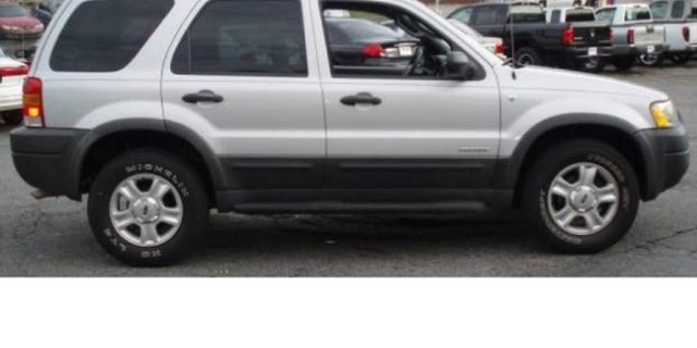 This image shows Spindler's 2002 silver Ford Escape -- with South Carolina license plate No. KFI776