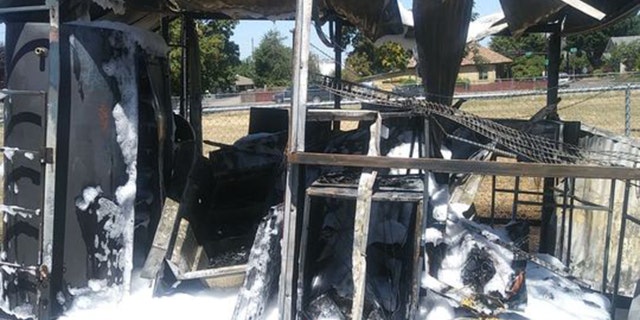 The trailer and attached grill, smoker, and miscellaneous equipment including refrigerators, slow cooker and signs went up in flames.