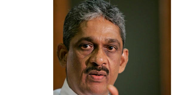 In this Sept. 8, 2010 file photo, Sri Lankan lawmaker and former military chief Sarath Fonseka addresses the media in Colombo, Sri Lanka.