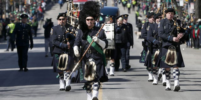 March 16, 2014: The Boston Police Gaelic Column marches in the annual St. Patrick's Day parade in the South Boston neighborhood of Boston. (AP Photo/Michael Dwyer)