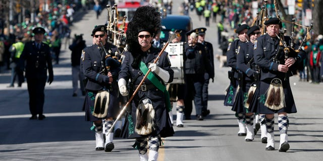 The Boston Police Gaelic Column marches in the annual St. Patrick's Day parade in the South Boston neighborhood of Boston, Sunday, March 16, 2014.
