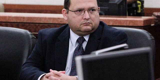 FILE - In this June 27, 2012, file photo, Raul Rodriguez looks at the Danaher family and friends after hearing victim impact statements in the 178th State District Court at the Harris County Criminal Justice Center in Houston. A Texas appeals court has ruled Thursday, Dec. 18, 2014, that Rodriguez, convicted of murder after jurors rejected his "stand your ground" self-defense claim, didn't get a fair trial and deserves a new one. (AP Photo/Houston Chronicle, Mayra Beltran, File)