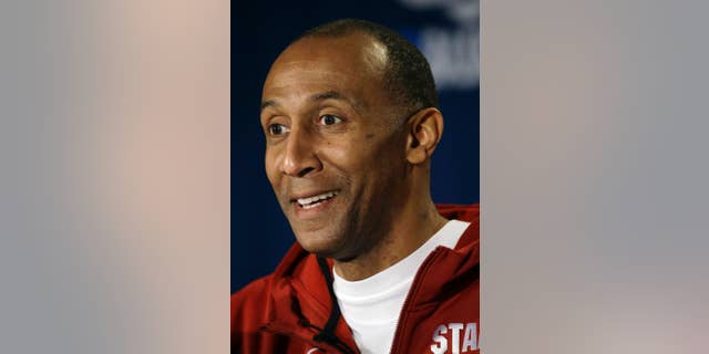 FILE - This March 22, 2014, file photo shows Stanford head coach Johnny Dawkins speaking during a news conference at the NCAA college basketball tournament in St. Louis. Dawkins has been rewarded for his impressive NCAA tournament run last season and overall strides as Stanford coach, receiving a contract extension Wednesday, Sept. 24, 2014. (AP Photo/Jeff Roberson, File)