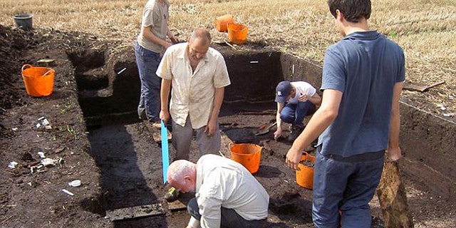 Archaeologists dig at Star Carr, where the oldest building in Britain was recently uncovered.