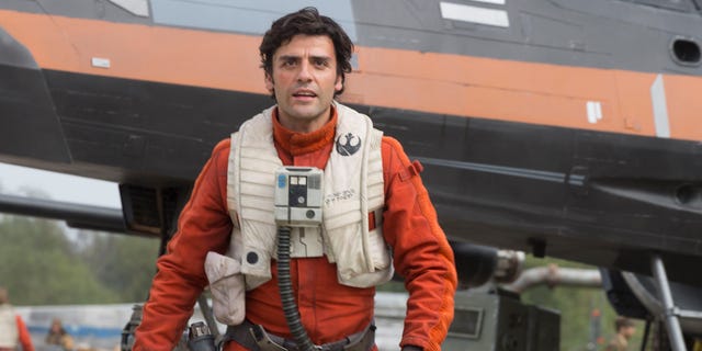 This photo provided by Disney/Lucasfilm shows Oscar Isaac as Poe Dameron in a scene from "Star Wars: The Force Awakens," directed by J. J. Abrams. The new film releases in U.S. theaters on Dec. 18, 2015. (David James/Disney/Lucasfilm via AP)