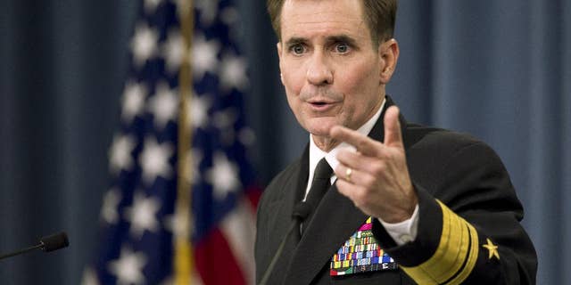 FILE - In this Nov. 7, 2014 file photo, Department of Defense Press Secretary Rear Admiral John Kirby, speaks to reporters during a news conference, at the Pentagon. U.S. officials say former Pentagon spokesman Admiral John Kirby will retire from the military and move to the State Department to be that agency's new public face. The officials say Secretary of State John Kerry tapped Kirby to be the department's spokesman. (AP Photo/Manuel Balce Ceneta)