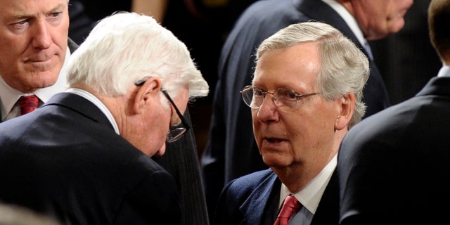 Senate Minority Leader Mitch McConnell of Ky. arrives for President Barack Obama's State of the Union address on Capitol Hill in Washington, Tuesday Jan. 28, 2014. (AP Photo/Susan Walsh)