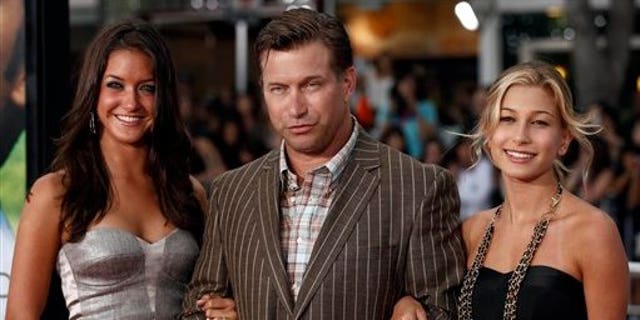 Actor Stephen Baldwin, center, and his daughters Alaia, left, and Hailey arrive at the premiere of "Charlie St. Cloud" in Los Angeles, Tuesday, July 20, 2010. (AP Photo/Matt Sayles)