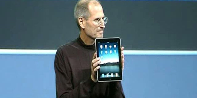During his keynote speech, Steve Jobs shows off the iPad at its January debut.