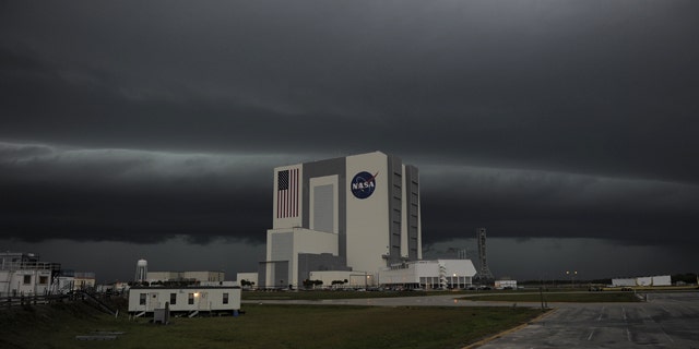 Severe storms darken the skies over Kennedy Space Center in Florida Thursday, causing delays in space shuttle Endeavours STS-134 mission launch dress rehearsal.