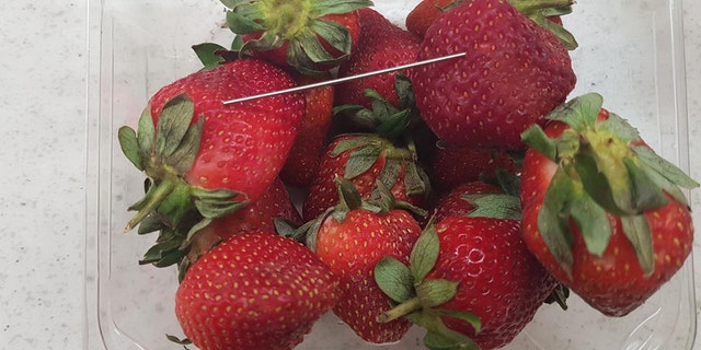 Queensland police in Australia issued a photo of a batch of "contaminated strawberries" in connection to what they said they believe is a "copycat incident."