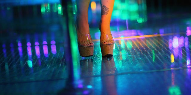 TAMPA, FL - AUGUST 25: Kendra performs at the '2001 Odyssey' strip club on August 25, 2012 in Tampa, Florida. Many of the 50 or so clubs operating in the Tampa area are hoping to see an increase in business as people arrive for the convention which starts the week of August 27th. (Photo by Joe Raedle/Getty Images)