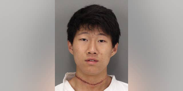 This photo provided by the Santa Clara Police Department, shows Dillon Kim after he was booked on attempted homicide charges on Tuesday, Feb. 17, 2015. Kim, a university student, has been arrested on suspicion of stabbing and wounding his roommate in their dormitory on a Northern California campus. Santa Clara police Lt. Kurt Clarke says that Dillon Kim stabbed his roommate multiple times with a knife about 3:30 a.m. Wednesday at Santa Clara University. (AP Photo/Santa Clara Police Department)