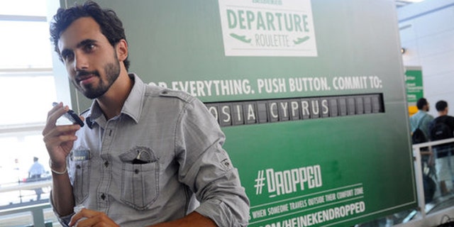 Greg Vosits, a student, delays his trip to visit grandparents in Austria after winning a trip to Cyprus from Heineken.
