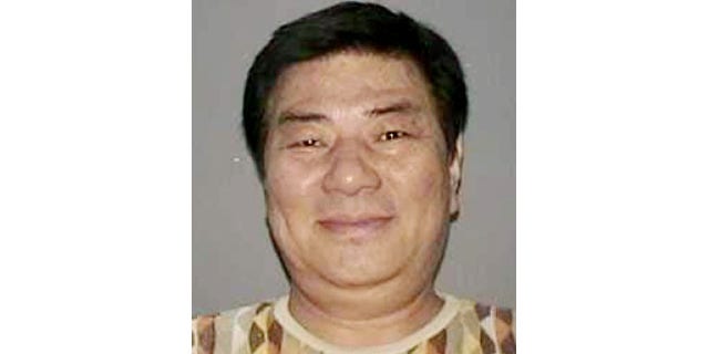 In this undated photo provided by the Nassau County Police Department in Mineola, N.Y. on Wednesday, Sept. 25, 2013, a New York State Driver’s License photo of Sang Ho Kim is shown. (AP Photo)