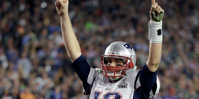New England Patriots quarterback Tom Brady (12) celebrates during the second half of NFL Super Bowl XLIX football game against the Seattle Seahawks on Sunday, Feb. 1, 2015, in Glendale, Ariz. The Patriots won 28-24. (AP Photo/Kathy Willens)