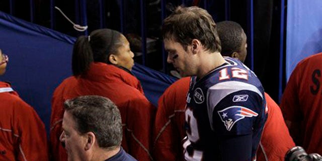 Feb. 5, 2012: New England Patriots quarterback Tom Brady leaves the field after Super Bowl loss.