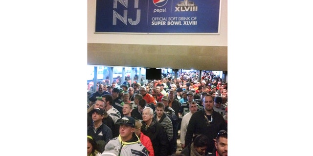 Feb. 2, 2014: Fans from Manhattan bound for MetLife Stadium and the Super Bowl crowd a NJ Transit station in Secaucus, N.J.