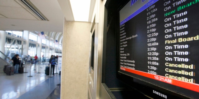 Oct 29, 2012 - File photo of display board with American Airlines canceled flights to New York.