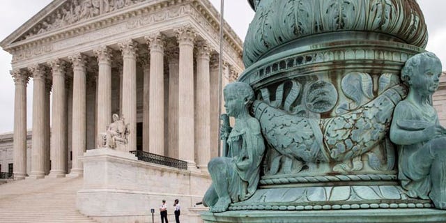 The Supreme Court in Washington is seen Tuesday, May 31, 2016, as the justices ruled unanimously that a Minnesota company could file a lawsuit against the U.S. Army Corps of Engineers over the agency's determination that its land is off limits to peat mining under the Clean Water Act. The high court agreed with the 8th Circuit decision in the case of Hawkes Co., Inc. v. U.S. Army Corps of Engineers to make it easier for landowners to bring a court challenge when federal regulators try to restrict property development due to concerns about water pollution. (AP Photo/J. Scott Applewhite)
