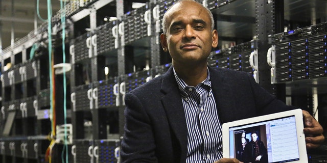 FILE - This Dec. 20, 2012 file photo shows Chet Kanojia, founder and CEO of Aereo, Inc., holding a tablet displaying his company's technology, in New York.  The Supreme Court has ruled that a start-up Internet company has to pay broadcasters when it takes television programs from the airwaves and allows subscribers to watch them on smartphones and other portable devices. The justices said Wednesday by a 6-3 vote that Aereo Inc. is violating the broadcasters' copyrights by taking the signals for free. The ruling preserves the ability of the television networks to collect huge fees from cable and satellite systems that transmit their programming. (AP Photo/Bebeto Matthews, File)