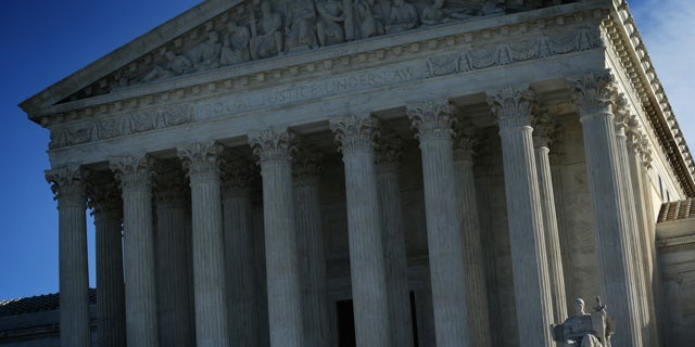 WASHINGTON, DC - JANUARY 09: An exterior view of the U.S. Supreme Court January 9, 2015 in Washington, DC. The justices of the Supreme Court were scheduled to meet to determine whether the court will take up any of the five pending state-banned same-sex marriage cases in Ohio, Tennessee, Michigan, Kentucky and Louisiana.> on January 9, 2015 in Washington, DC. (Photo by Alex Wong/Getty Images)
