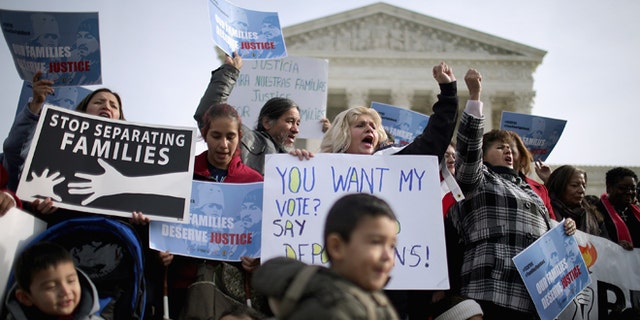 WASHINGTON, DC - JANUARY 15: About fifty pro-immigration reform demonstrators gathered for a rally outside the United States Supreme Court January 15, 2016 in Washington, DC. Organized by immigraiton advocacy group CASA, the demonstrators called on the Supreme Court to take up and overrule a lower court's ruling against President Barack Obama's 2014 immigration executive actions, including the Deferred Action for Parental Accountability (DAPA) program and expanded Deferred Action for Childhood Arrivals (DACA) guidelines. (Photo by Chip Somodevilla/Getty Images)