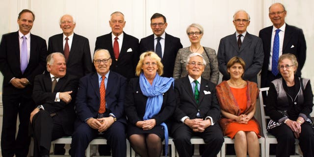 April 16: Current or former top politicians and diplomats pose for a picture prior to a formal dinner focusing on an ongoing environment conference, at Sweden's government headquarters in Stockholm. Margareta Winberg is sitting front right.