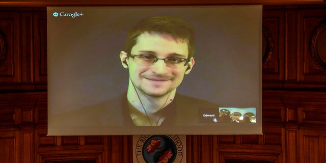 Dec. 1, 2014 - Edward Snowden, shown on a livestream from Moscow, is awarded the Right Livelihood Award ceremony at the Swedish Parliament, in Stockholm. Snowden, a co-winner of the award, has called on the UN for measures to protect individual privacy and human rights.