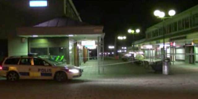 March 18, 2015: In this image from Swedish TV4 a police car sits near the Var Krog och Bar in the city of Goteborg.