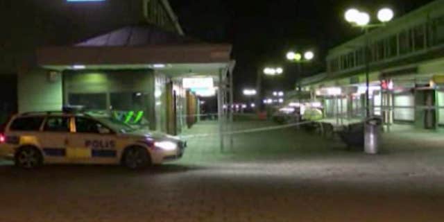 March 18, 2015: In this image from Swedish TV4 a police car sits near the Var Krog och Bar in the city of Goteborg.