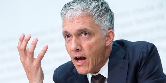 Swiss attorney general Michael Lauber speaks during a press conference in Bern, Switzerland, Wednesday, June 17, 2015. Lauber said that banks have noted 53 possible money-laundering cases in a FIFA probe. (Marcel Bieri/Keystone via AP)