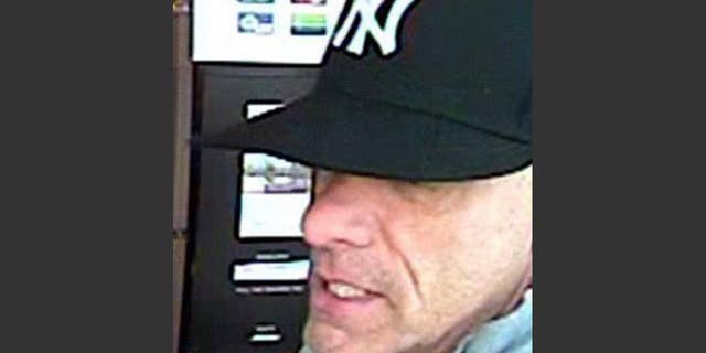 This undated surveillance photo provided by the York Regional Police shows a bank robbery suspect, not identified by name, but nicknamed "The Vaulter Bandit." On Tuesday, Sept. 15, 2015, Geneva police arrested the suspect, who had been sought under an international arrest warrant issued by Canada in connection with 22 bank robberies over the last five years. (Courtesy of York Regional Police/The Canadian Press via AP)