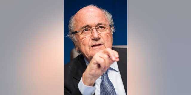 FILE - In this March 20, 2015 file photo FIFA President Joseph Blatter speaks to journalists following the FIFA Executive Committee meeting in Zurich, Switzerland. Blatter told Tuesday's May 12, 2015 edition of free Swiss daily 20 Minutes that his presidency benefited from a boom in soccer's finances and development fueled by television rights deals. (Ennio Leanza/Keystone via AP, File)