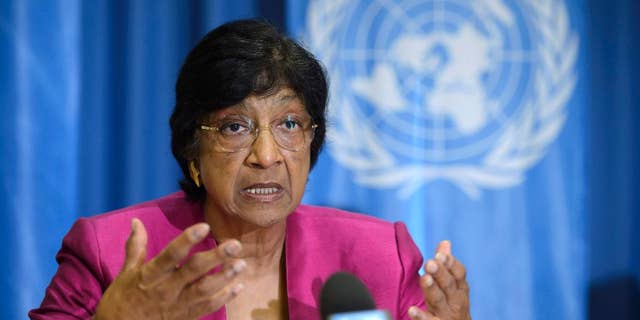 July 31, 2014: UN High Commissioner for Human Rights, South African Navi Pillay, answers journalist's questions about the human rights situation in the world, during a press conference at the Geneva Press Club, in Geneva, Switzerland.