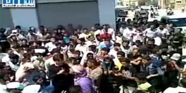 Aug. 12, 2011: This image made from amateur video released by Shams News Network and accessed via The Associated Press Television News shows a protest march in Hama Syria.