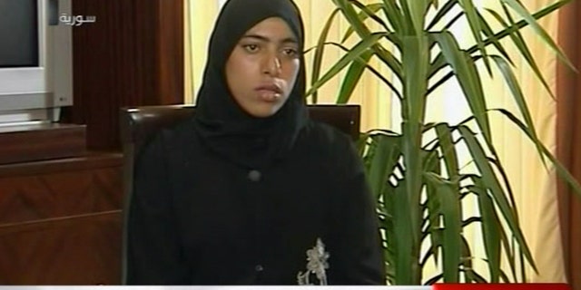 October 5: Pictured is an 18-year old Syrian woman, Zainab al-Hosni, who claims to be the woman who was previously reported to have been beheaded and mutilated by Syrian security agents while in custody in her hometown of Homs.