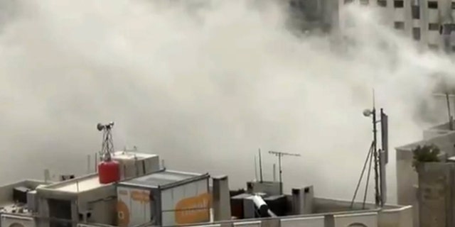 April 2, 2013: In this image taken from video obtained from Shaam News Network, which has been authenticated based on its contents and other AP reporting, shows smoke from heavy shelling in the Jobar neighborhood in north Damascus, Syria.