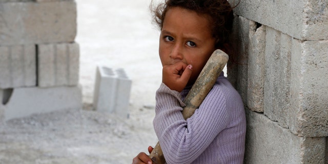 A Syrian refugee in Bekaa Valley, Lebanon September 21, 2013. Lebanon, which is hosting over 700,000 Syrian refugees, has vowed to vaccinate all children under 5 for polio after a recent outbreak of the disease in neighboring Syria. (REUTERS/Jamal Saidi)