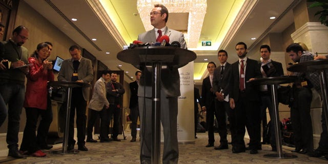 March 18, 2013: Khalid Saleh, the spokesman for the opposition Syrian National Coalition, speaks to reporters in Istanbul, Turkey.