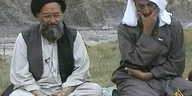 In this television image from Arab satellite station Al-Jazeera, Usama bin Laden, right, listens to his top deputy Ayman al-Zawahri speaking at an undisclosed location. The Associated Press says the CIA's pursuit of al-Zawahiri, a nine-year hunt at the root of last year's devastating suicide bombing at an agency base in Afghanistan, has come closer to capturing or killing the terrorist leader than previously known.