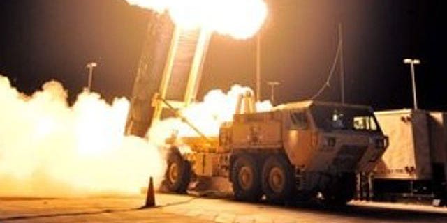 October 5, 2011: In this photo provided by the U.S. Missile Defense Agency, a Terminal High Altitude Area Defense (THAAD) interceptor missile is launched during the system's first operational test at the Pacific Missile Range Facility in Kauai, Hawaii.
