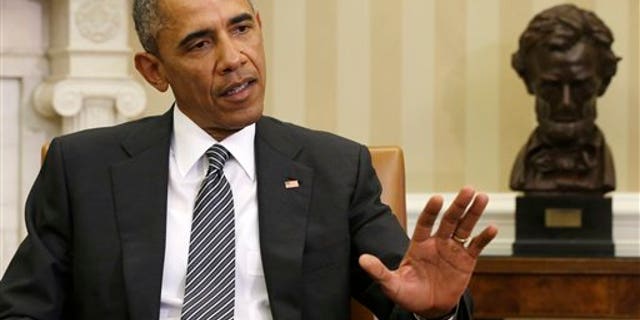 President Barack Obama meets with Secretary of Defense Ash Carter in the Oval Office of the White House, Tuesday, Feb. 17, 2015, in Washington. (AP Photo/Jacquelyn Martin)